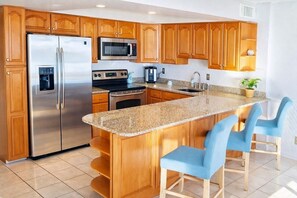Fridge, microwave, oven, stovetop - Beautiful and comfortable 2 bedroom oceanfront condo with free WiFi and beautiful ocean view located midtown just steps to the beach! (Ocean City)