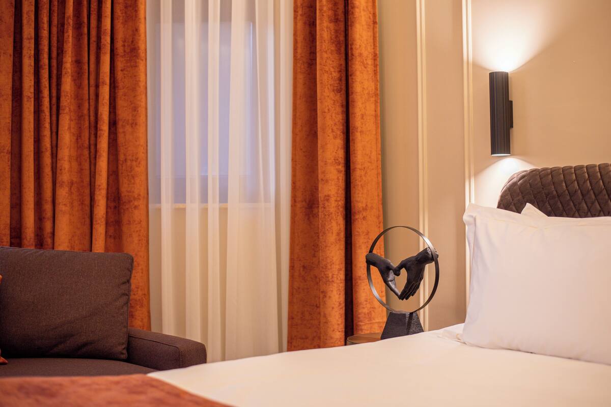 Premium bedding, down comforters, desk, laptop workspace