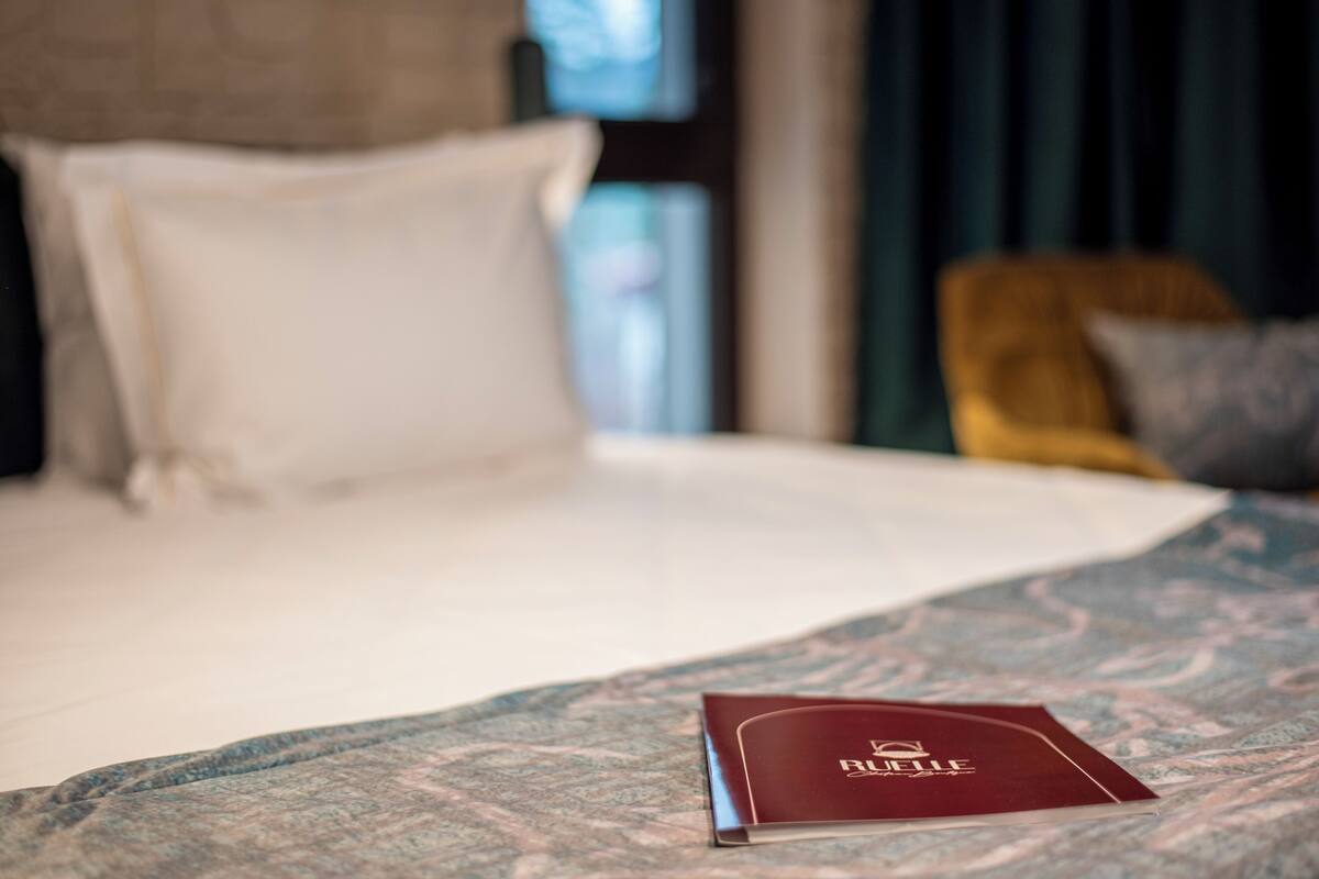Premium bedding, down comforters, desk, laptop workspace