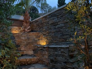A stone staircase leading up to a building, surrounded by greenery. - 3-Bedroom House with Private Pool and Sea View (La Croix-Valmer)