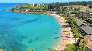 A coastal resort with a beachfront, clear waters, and a variety of buildings including hotels and villas. - Walk to Beach and Dining + AC - Napili Shores D224 - Updated Studio (Lahaina)