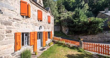 Cottage in Aubrac by Rimeize River