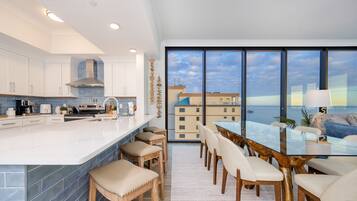 Condo, 4 Bedrooms | Private kitchen | Fridge, oven, coffee/tea maker