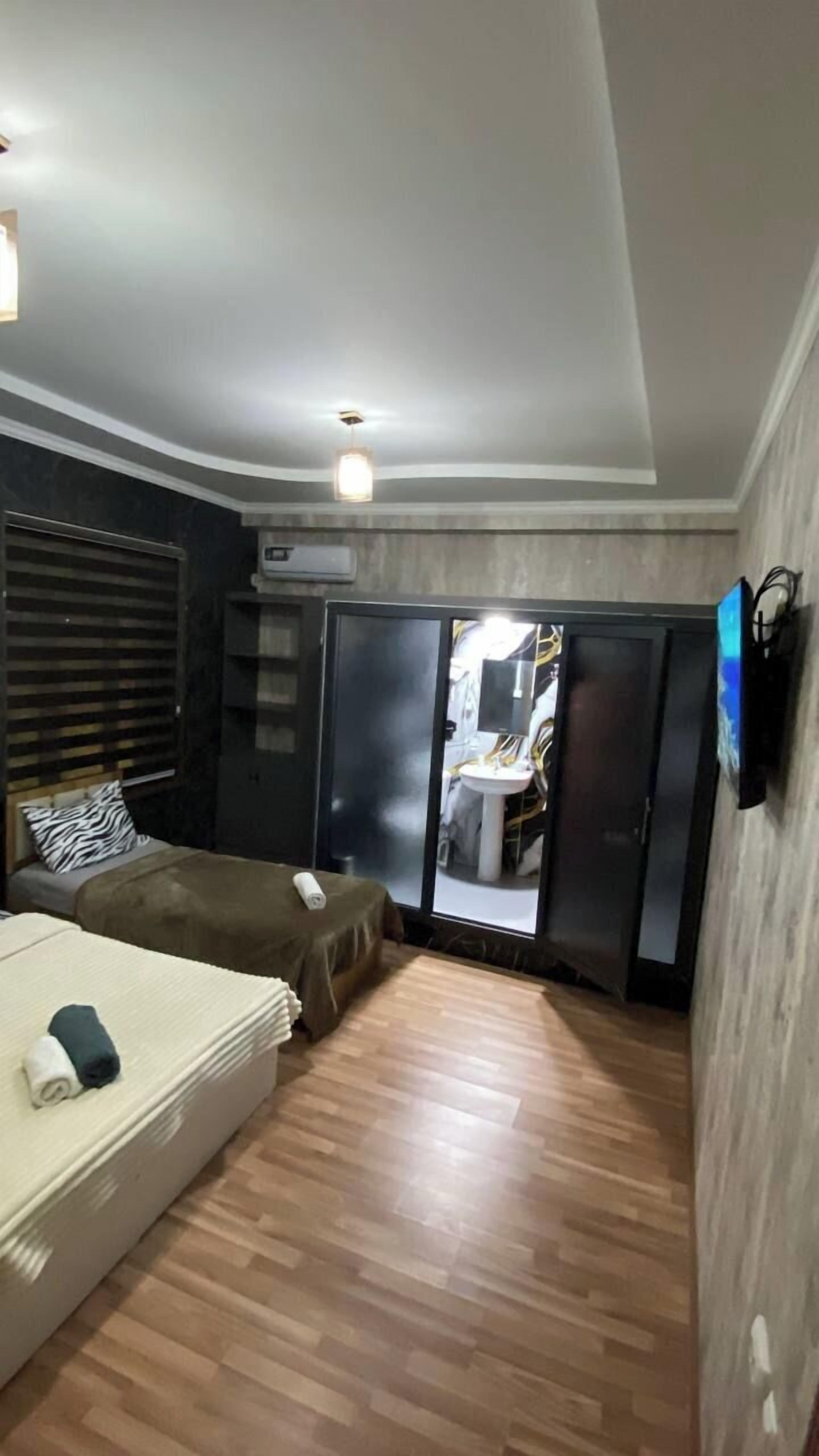 Family Quadruple Room | Premium bedding, down comforters, pillowtop beds, minibar