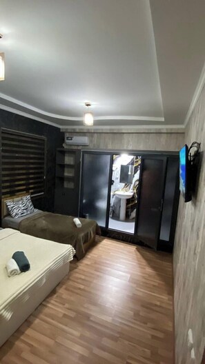 Family Quadruple Room | Premium bedding, down duvets, pillow-top beds, minibar