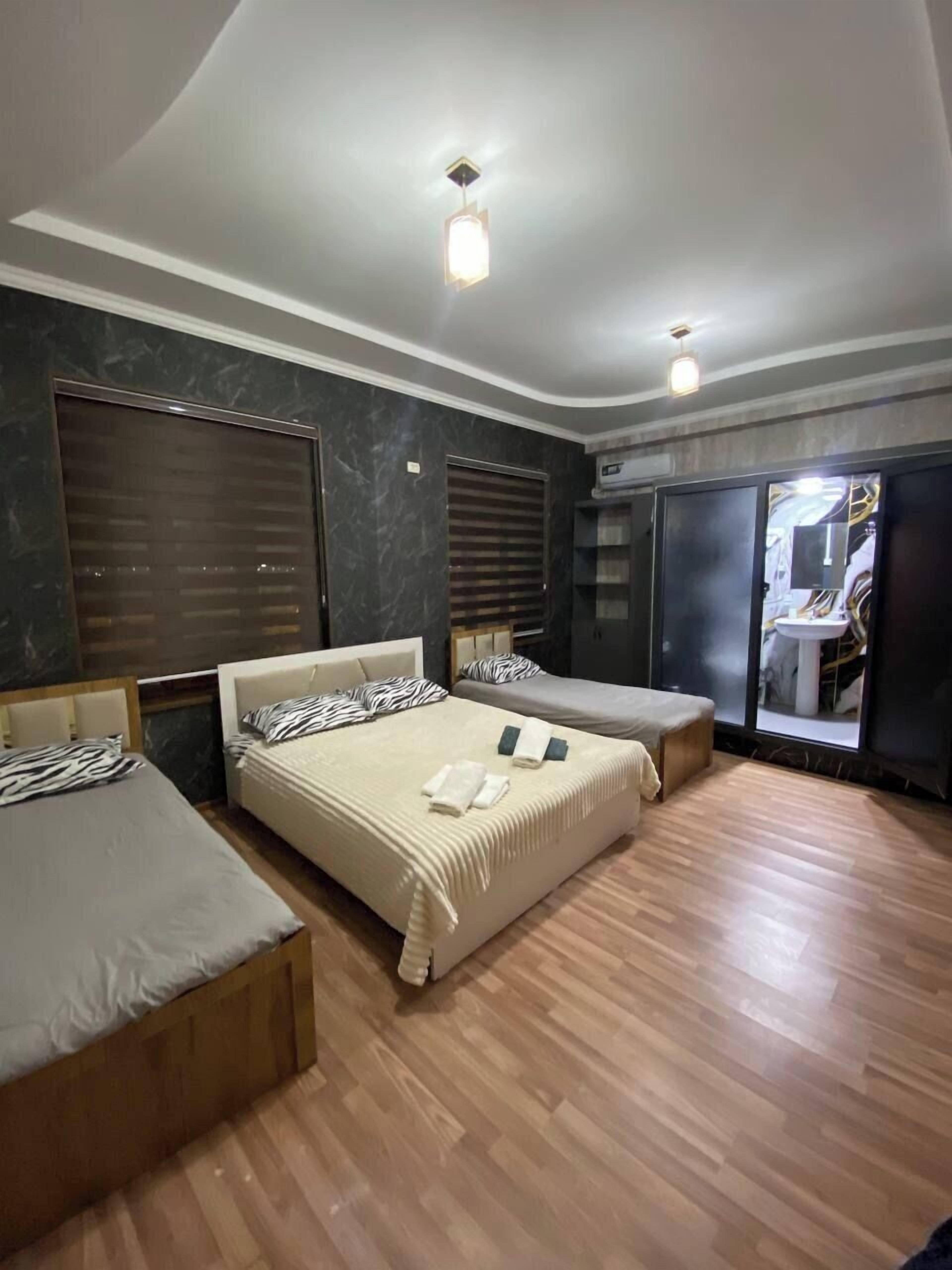 Family Quadruple Room | Premium bedding, down duvets, pillow-top beds, minibar