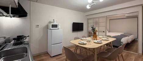 Departamento superior | Área de sala de estar | Smart TV de 55 pulgadas con canales por cable