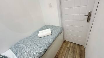 Economy Single Room, Balcony, City View | Iron/ironing board, free WiFi