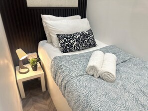 Economy Single Room, Balcony, City View | Iron/ironing board, free WiFi - Rest Partition Room in Tecom Near Metro (Dubai)