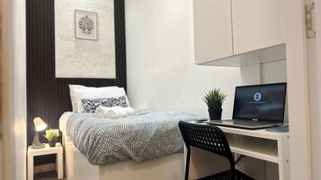 Economy Single Room, Balcony, City View | Iron/ironing board, free WiFi