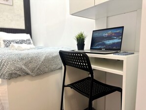 Economy Single Room, Balcony, City View | Iron/ironing board, free WiFi