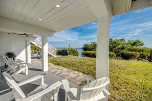 Terrace/patio - Charming 2 BR downstairs hideaway directly on the bay, 5 minutes away from the beach - 3 BR upstairs unit also available for rent - new pool and spa will be installed by November 2026 (Fort Myers Beach)