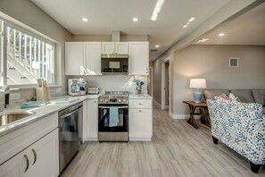 Fridge, microwave, oven, stovetop - Charming 2 BR downstairs hideaway directly on the bay, 5 minutes away from the beach - 3 BR upstairs unit also available for rent - new pool and spa will be installed by November 2026 (Fort Myers Beach)