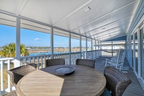 Outdoor dining - Home Again - 4 Bedroom 3 Bath Newly Renovated Channel Front Home (Garden City Beach)