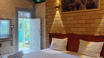 Triple Room, Garden View | Iron/ironing board, free WiFi