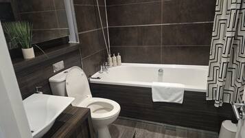 Shower, hair dryer, towels