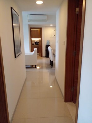 Comfort Double Room, Pool View | Living area | Flat-screen TV - gems havelock apartment  (Colombo)