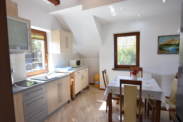 Appartement | Cuisine privée | Chaise haute