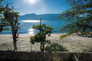 On the beach, sun-loungers, beach towels