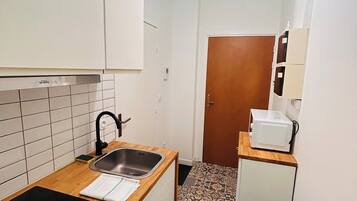 Fridge, microwave, coffee/tea maker, toaster