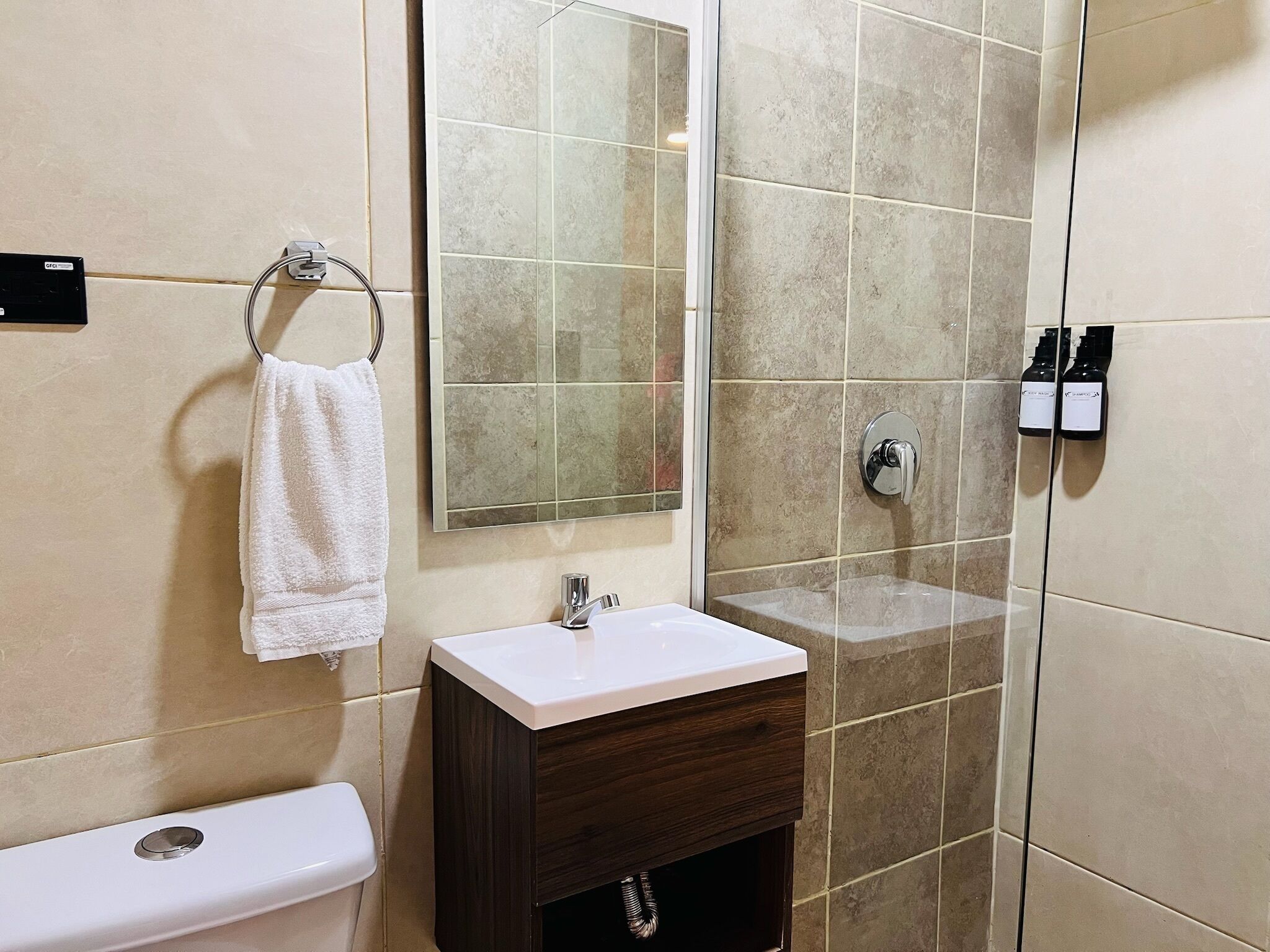 Shower, towels, soap, shampoo