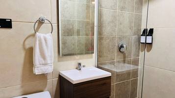 Shower, towels, soap, shampoo