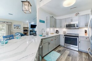Fridge, microwave, oven, stovetop - Pet-friendly oceanside Duck home with hot tub by Sun Realty (Duck)