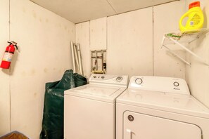 Ground Level Laundry Area - Sun Realty pet-friendly oceanside home with private pool! (Duck)