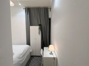 Economy Double Room, Balcony, City View | Iron/ironing board, free WiFi - Adventurers Partition Room in Tecom (Dubai)