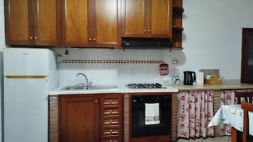 Réfrigérateur, plaque de cuisson, cafetiÚre/bouilloire