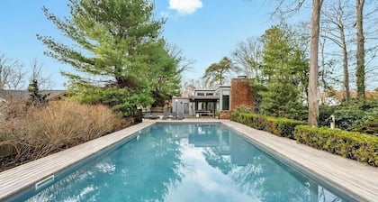 Private Hampton Bays escape featuring a private pool and covered patio for...