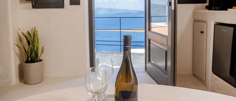 Aether Suite with Caldera View & Outdoor Jetted Tub | Living area