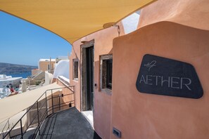 Aether Suite with Caldera View & Outdoor Jetted Tub | Terrace/patio - One of One Suites (Santorini)