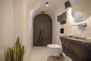 Aether Suite with Caldera View & Outdoor Jetted Tub | Bathroom | Shower, free toiletries, hair dryer, towels - One of One Suites (Santorini)
