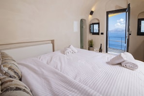 Aether Suite with Caldera View & Outdoor Jetted Tub | Free WiFi - One of One Suites (Santorini)