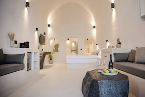 Aurelia Suite | Living area | 42-inch flat-screen TV with satellite channels - One of One Suites (Santorini)