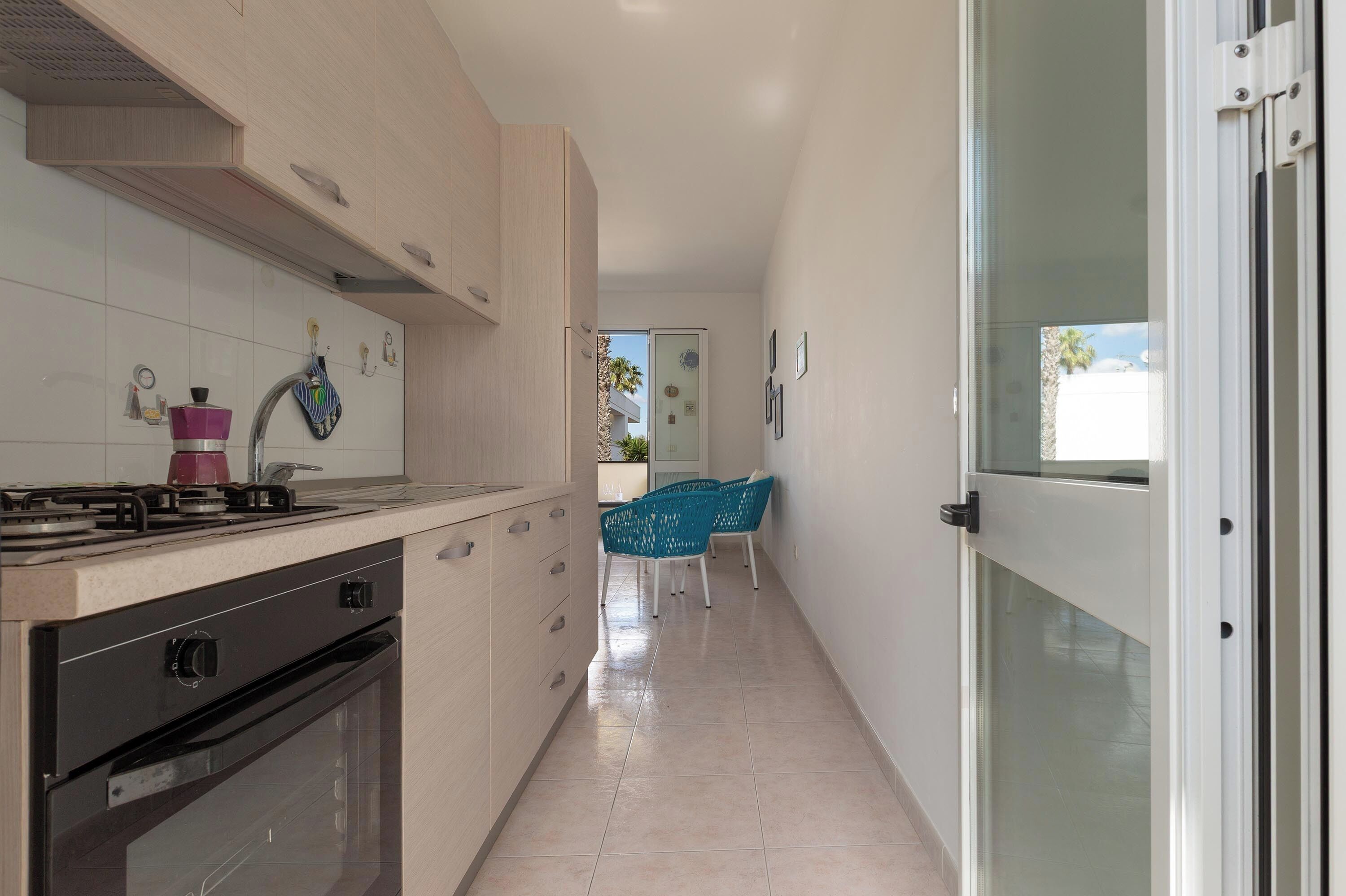 Fridge, stovetop, coffee/tea maker, cookware/dishes/utensils