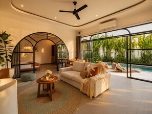 Luxury Villa, Patio, Pool View | Living area | 42-inch Smart TV with digital channels, streaming services - Villa Talitha by DVH Luxe Tropical Pool (Canggu)