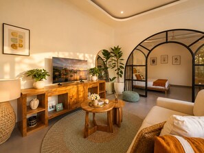 Luxury Villa, Patio, Pool View | Living area | 42-inch Smart TV with digital channels, streaming services - Villa Talitha by DVH Luxe Tropical Pool (Canggu)