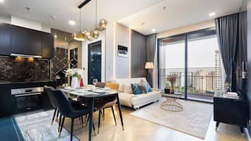 Luxury Apartment, 3 Bedrooms, Air conditioning, City View | Living area | 55-inch Smart TV with digital channels