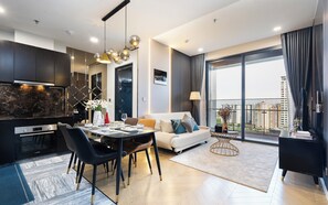 Luxury Apartment, 3 Bedrooms, Air conditioning, City View | Living area | 55-inch Smart TV with digital channels - Sunny Lumiere Riverside Luxury Residence (Ho Chi Minh)