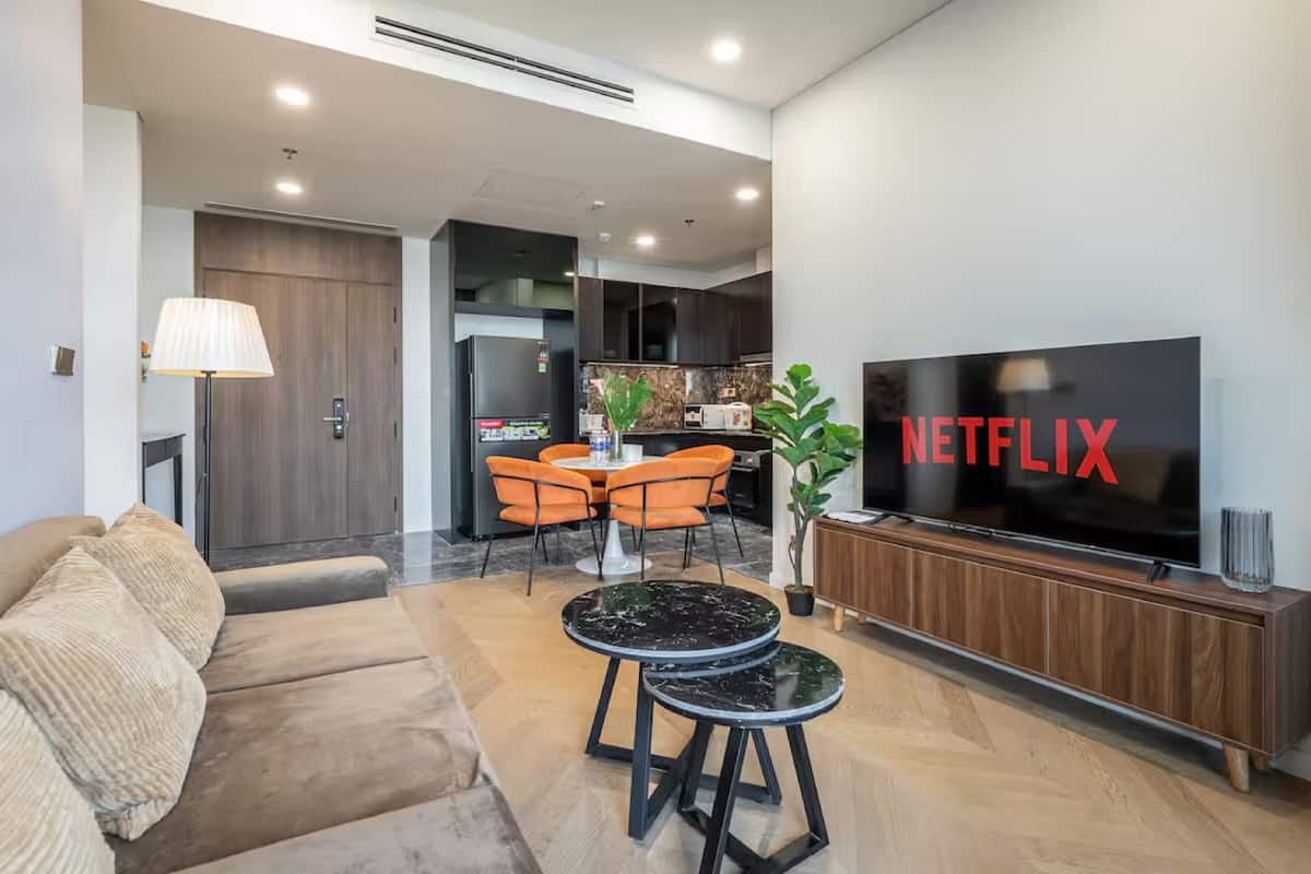 Luxury Apartment, 2 Bedrooms, City View | Living area | 55-inch Smart TV with digital channels