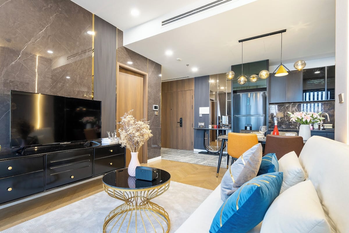 Luxury Apartment, 3 Bedrooms, Air conditioning, City View | Living area | 55-inch Smart TV with digital channels