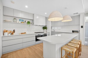 Apartment | Private kitchen - Coastal Luxe 4-bed House in Madora Bay (Perth)