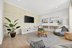Apartment | Living room - Coastal Luxe 4-bed House in Madora Bay (Perth)