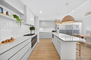 Apartment | Private kitchen - Coastal Luxe 4-bed House in Madora Bay (Perth)