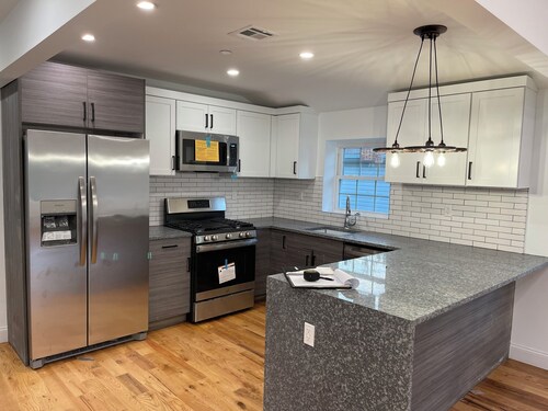 Modern 4-bedroom townhome in lovely Jamaica with cool AC