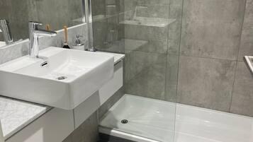 Hair dryer, towels, soap, toilet paper