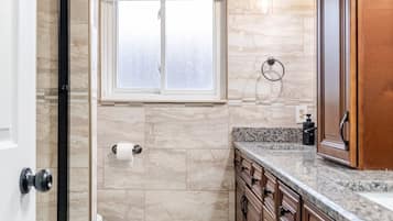 Shower, jetted tub, hair dryer, bidet