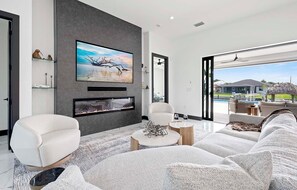 Smart TV, fireplace, table tennis, books